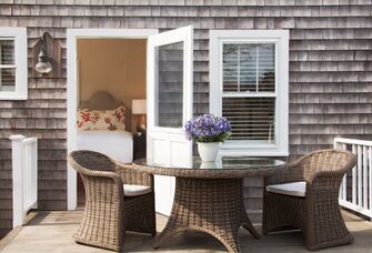the wauwinet nantucket romantic setting for couple with arrangement and bed in backdrop for elopements