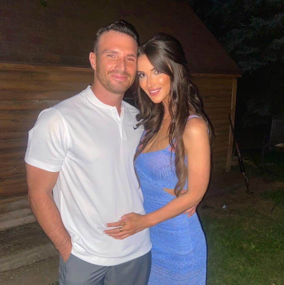 Our first photo together as a couple — taken at Bri’s nursing school graduation party.
This was also the night Kyle met Bri’s parents for the first time! 