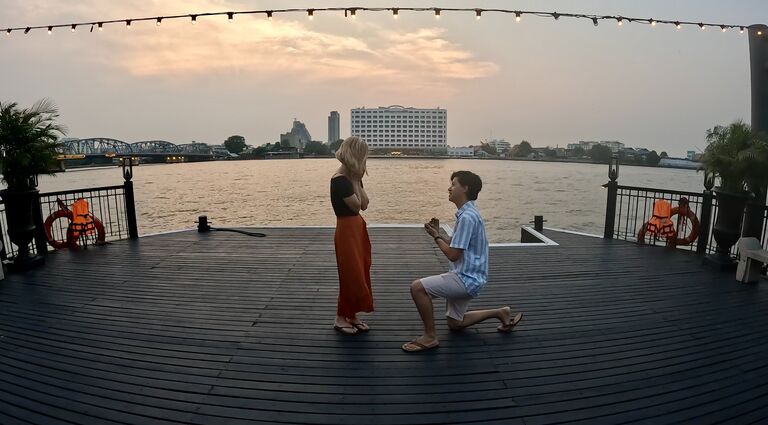 Josh pops the question alongside the Chao Phraya River at The Siam hotel in Bangkok, Thailand! 