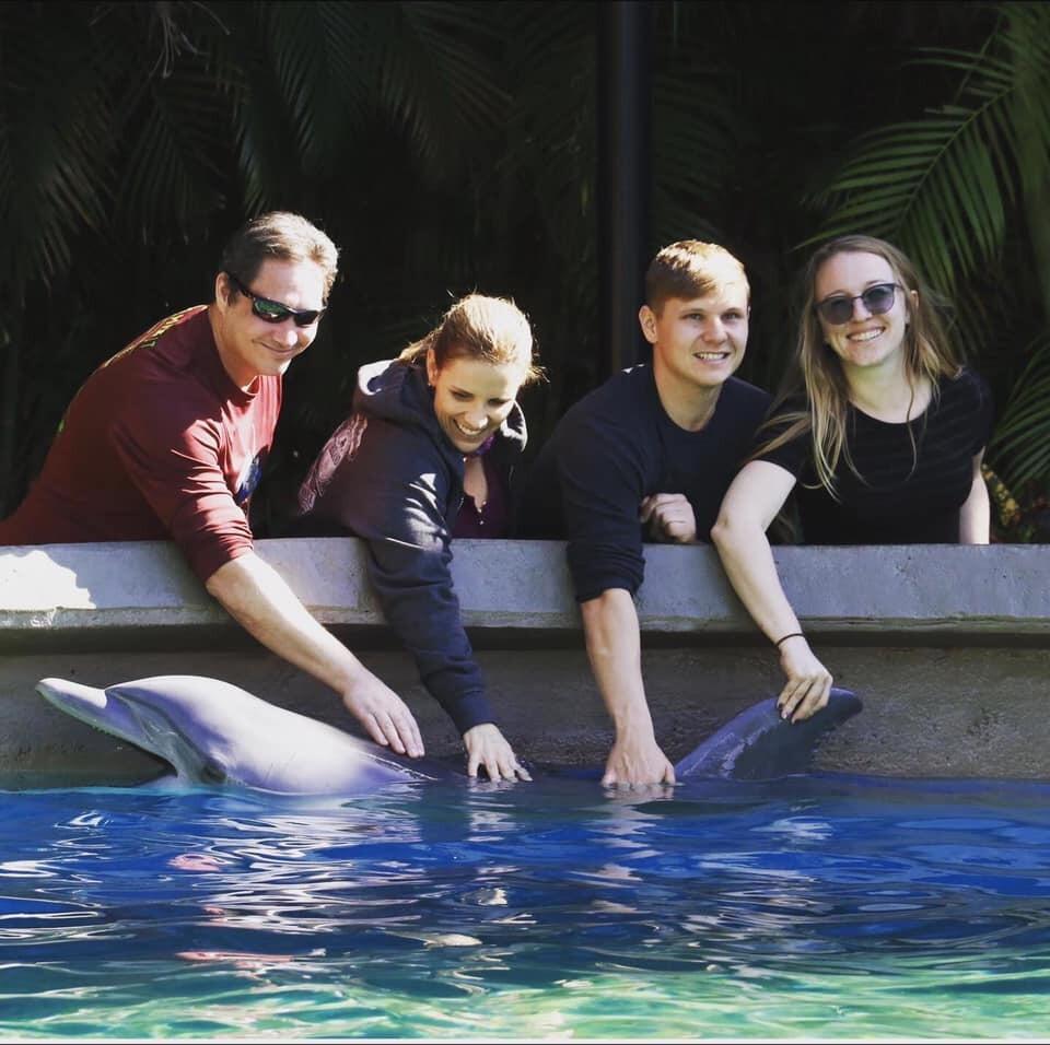During a trip to Seaworld, where James was working, they meet a dolphin named Kyla. She's a crack up! Her favorite thing to do is make fart noises from her blowhole. 