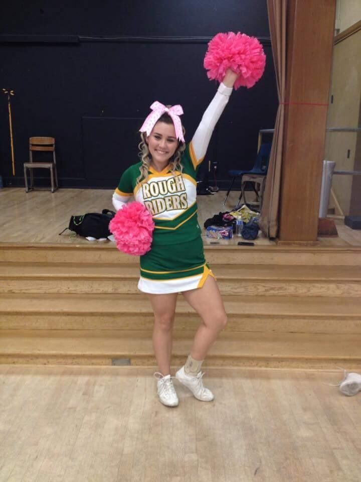 Emily spends her year dancing and cheering with her friends at school.