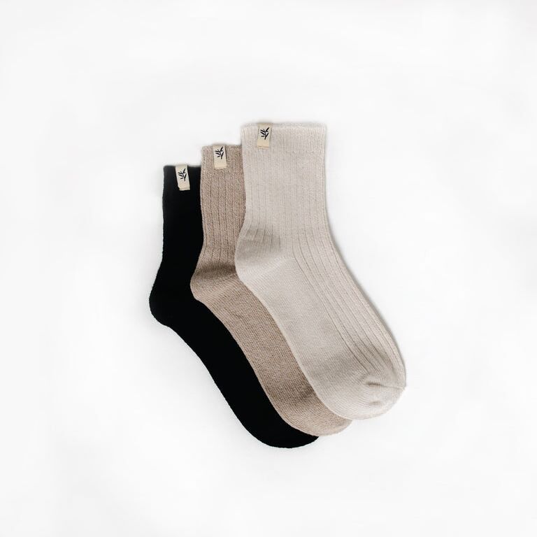 White, beige and black pairs of socks