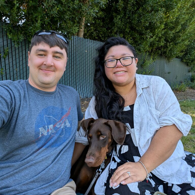 Before their next planned vacation, Mitchell sneakily planned what seemed to be a normal weekend picnic at a local park and asked Tina to marry him. She said, "Yes"! 

Even though they had picked a ring together ahead of time, it was up to Mitchell to surprise her. And she was surprised. 
