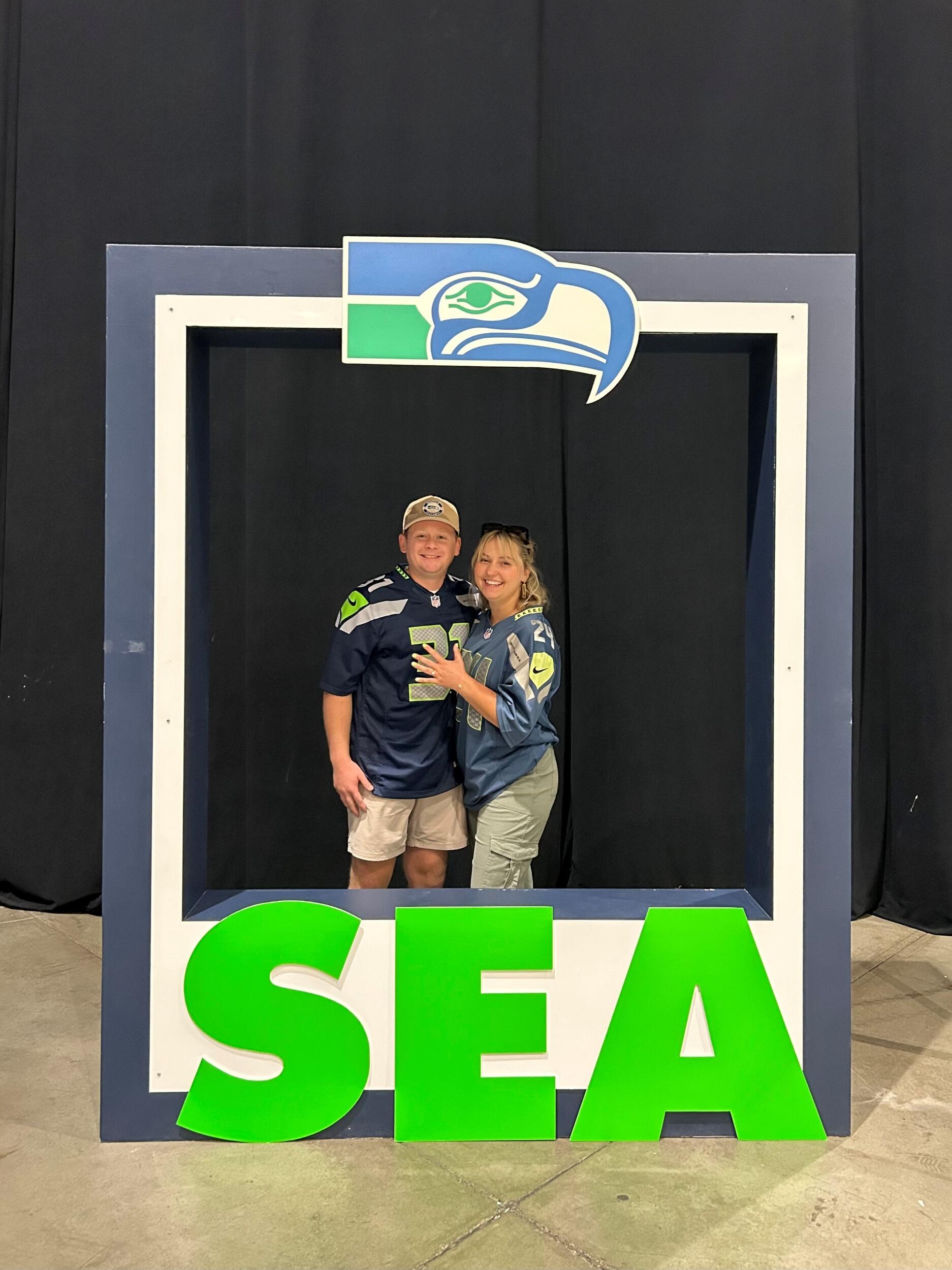 Celebrating the engagement with a Seahawks game