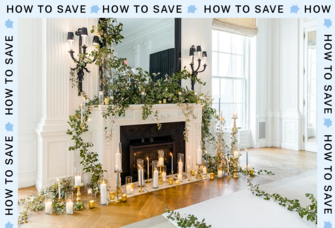 fireplace decorated with greenery and candles