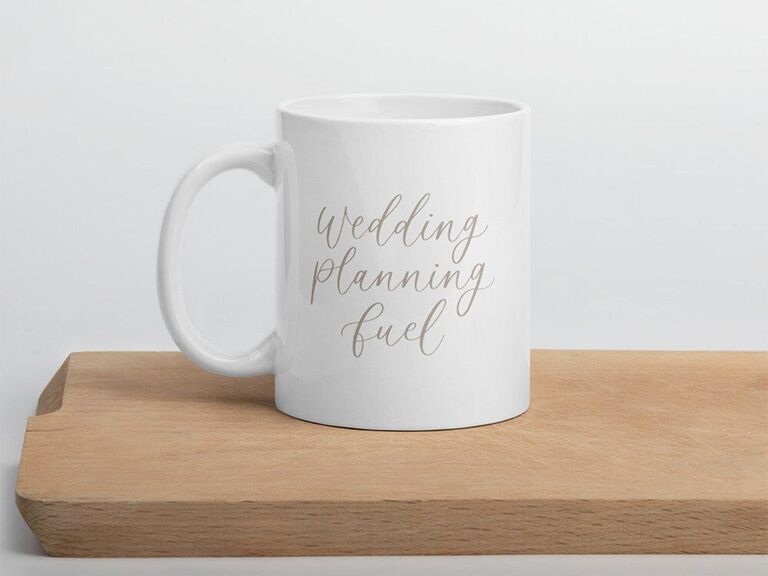 'Wedding planning fuel' in elegant light gray type on white mug