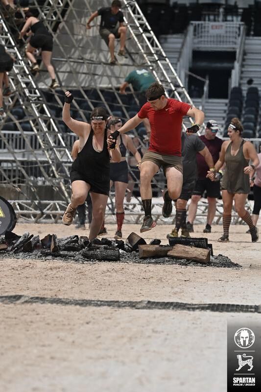 Sam and Alex at the finish line of a Spartan Race near Asheville, NC. Look at those facial expressions!