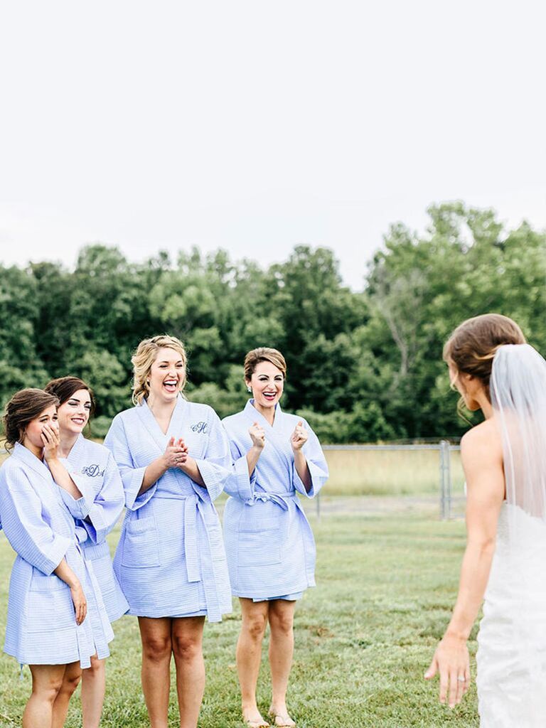 Bridal party seeing the bride for the first time