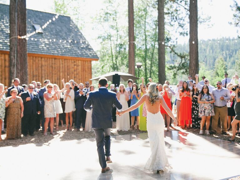 Bride and groom on dance floor at reception