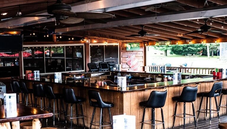 Lukas and Katie formally meet for the first time at Edge-O-Dells Campground Bar & Restaurant while Katie is on a family camping trip and Lukas is at a bachelor party. 