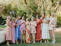 Group of ladies wearing lovely summer wedding guest dresses