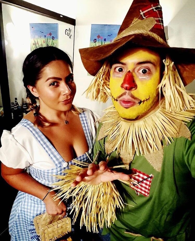 Dorothy and the Scarecrow from The Wizard of Oz.