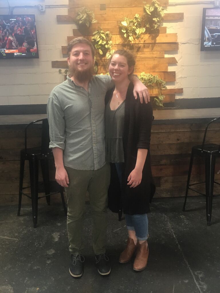 Two months after our first date, we took our very first (and very awkward) photo together