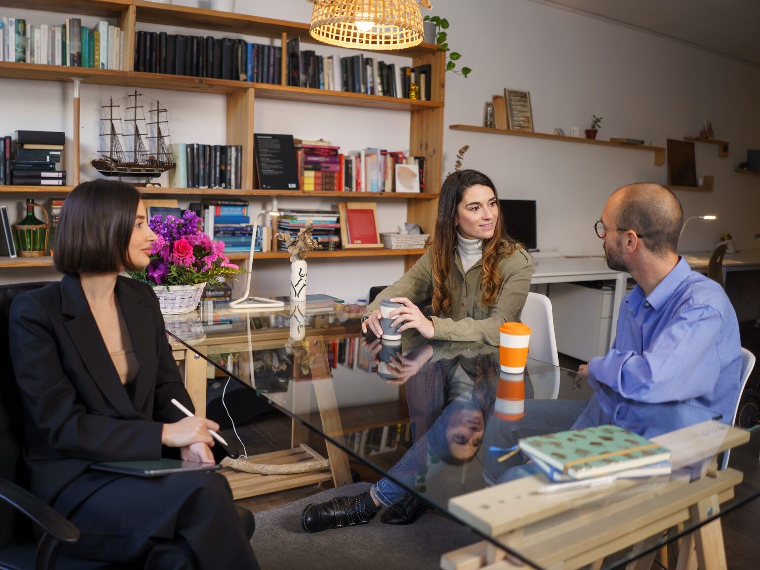 Couple sitting with a premarital counsellor