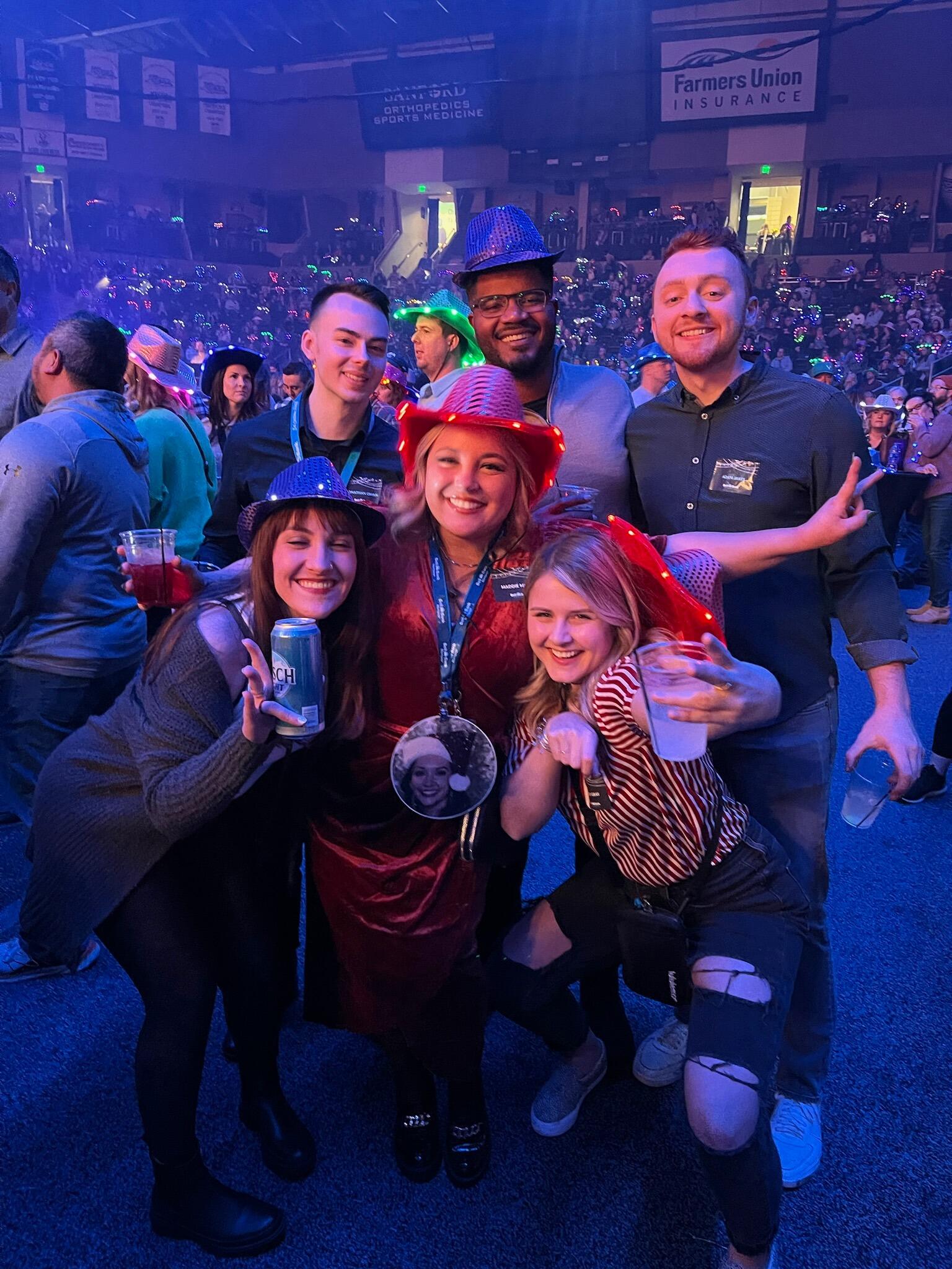 Maddie takes Jon along for her Christmas Party in Fargo, ND. The icing on top is that a handful of Maddie's close friends also attended!