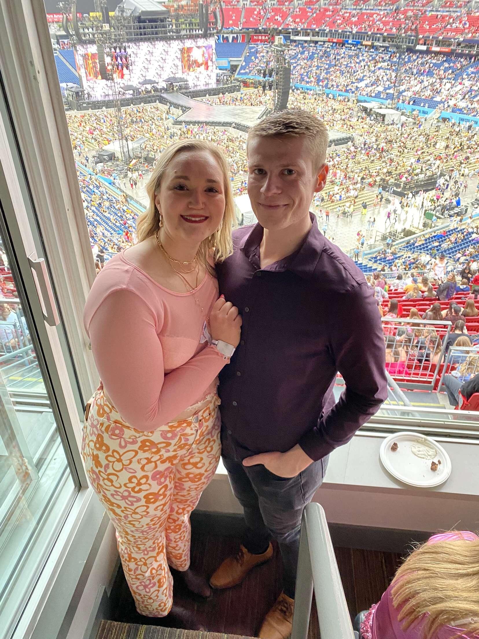 Emily takes Kevin to his first Taylor Swift concert.