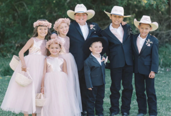 Ring bearers wearing cowboy hats and flower girls wearing tulle dresses, ring bearer and flower girl age