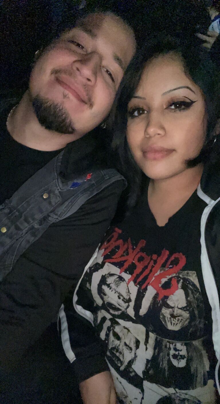 Another Slipknot concert- Mark made sure Jazmine and her small pregnant belly were safe.