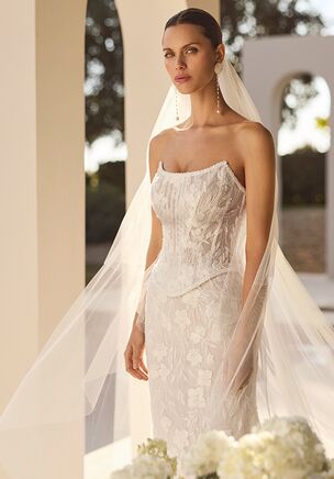 Two-piece mermaid silhouette wedding dress with sweetheart neckline in beaded lace and corset finish