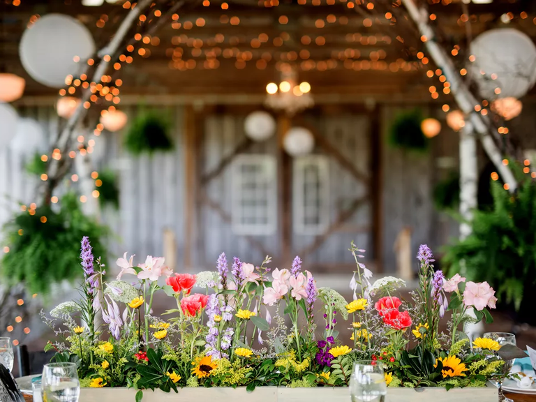 A wildflower-themed wedding reception area