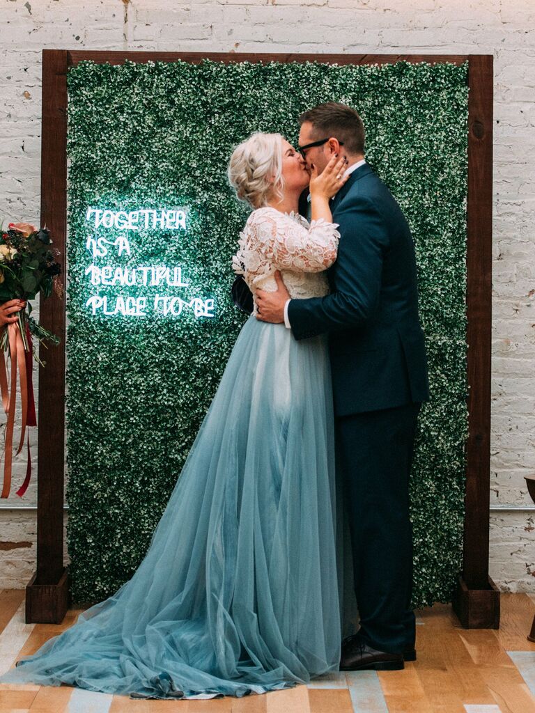 wedding sign quotes neon sign on greenery backdrop