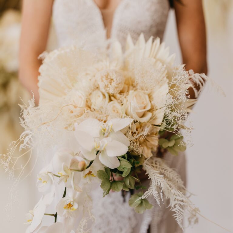 All-white orchid wedding bouquet