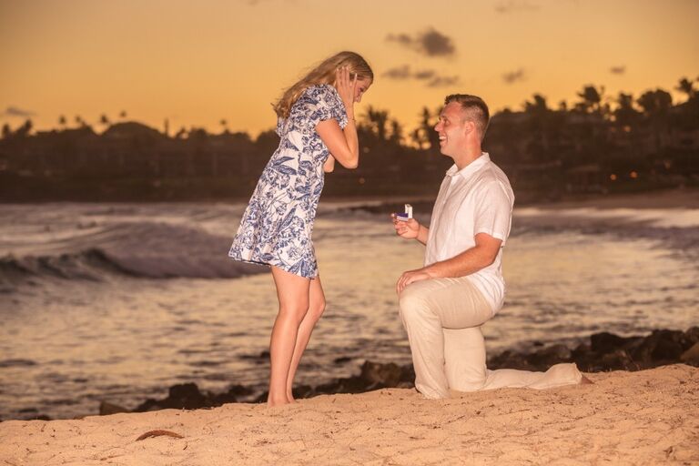 Justin proposed to Julia in Kaui, Hawaii at Shipwreck Beach on the day they met 3 years later. Lots of happy tears from Julia as Justin pulled off the surprise of a lifetime. 
