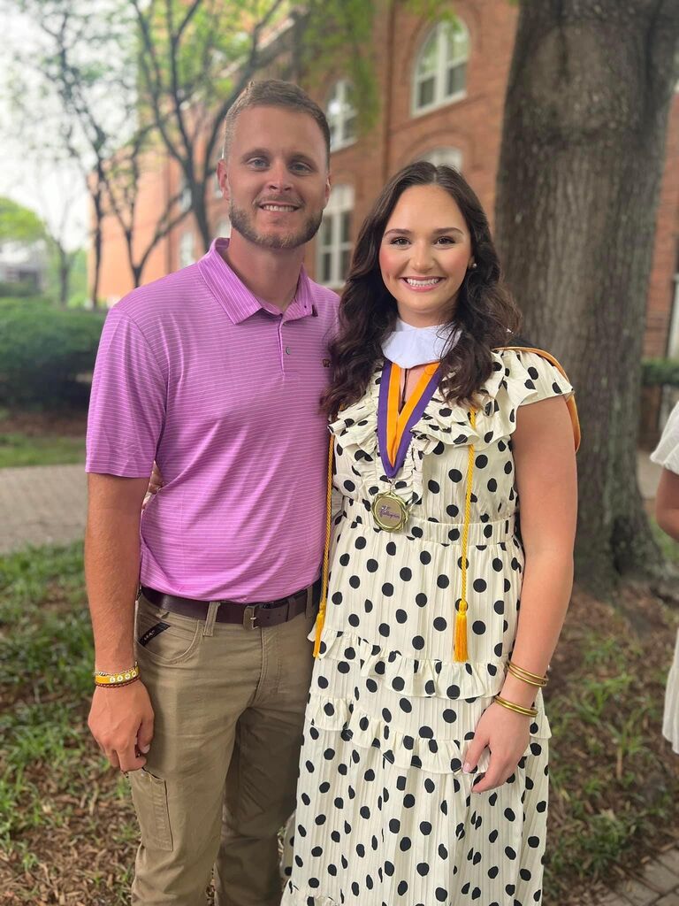 Abbey's college graduation ceremony! After deciding to graduate early, Hunter was there for every step. He heard all the tears, spent hours helping me study, pretending to be my class so I could practice my lessons, and helped me prepare some lessons! I finished in December 2023, and immediately started working. Was it crazy.. YES! But with support, it was worth it. 