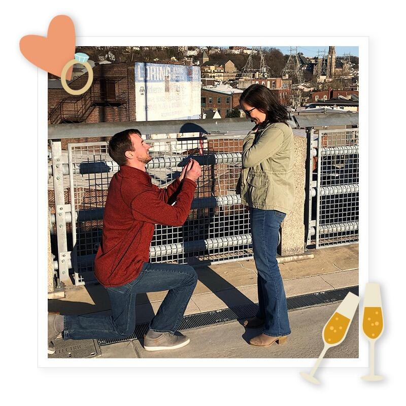6 years later Tim took Julie to their favorite burger restaurant (Lucky's!) for lunch. Afterwards, he got down on one knee on top of the Manayunk bridge, overlooking where it all began and popped the question!