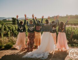 bride and bridesmaids wearing custom denim jackets