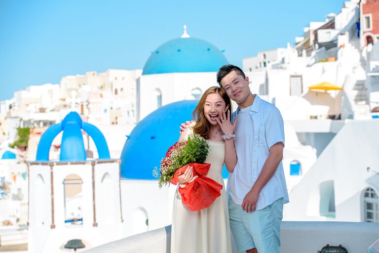 We got engaged in Santorini, with the famous and beautiful caldera views