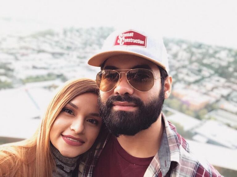 After a couple months into our relationship, Alex returned to work in Seattle, WA and we had a long distance relationship. I flew up to visit him one weekend and we took this picture at the top of the Space Needle.