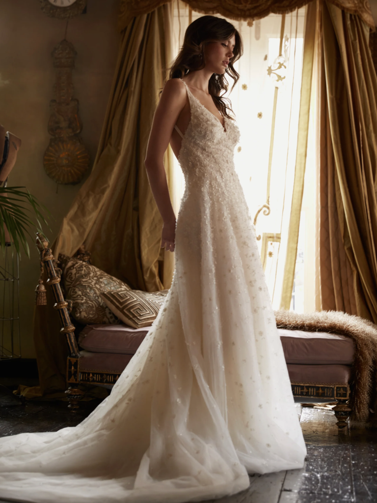 Shimmering A-line Wedding Dress with Floral Pattern and Voluminous