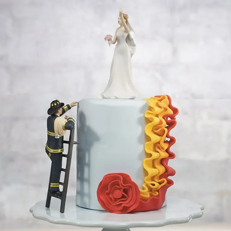 Fireman Rescuing His Bride Wedding Cake Topper
