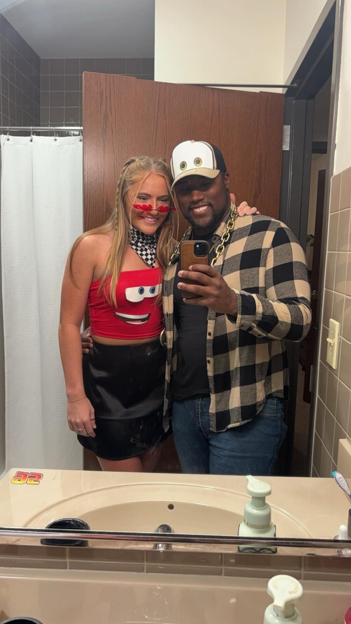 Sam and Thomas dressed up as Lighten McQueen and Tow Mater for Halloween.