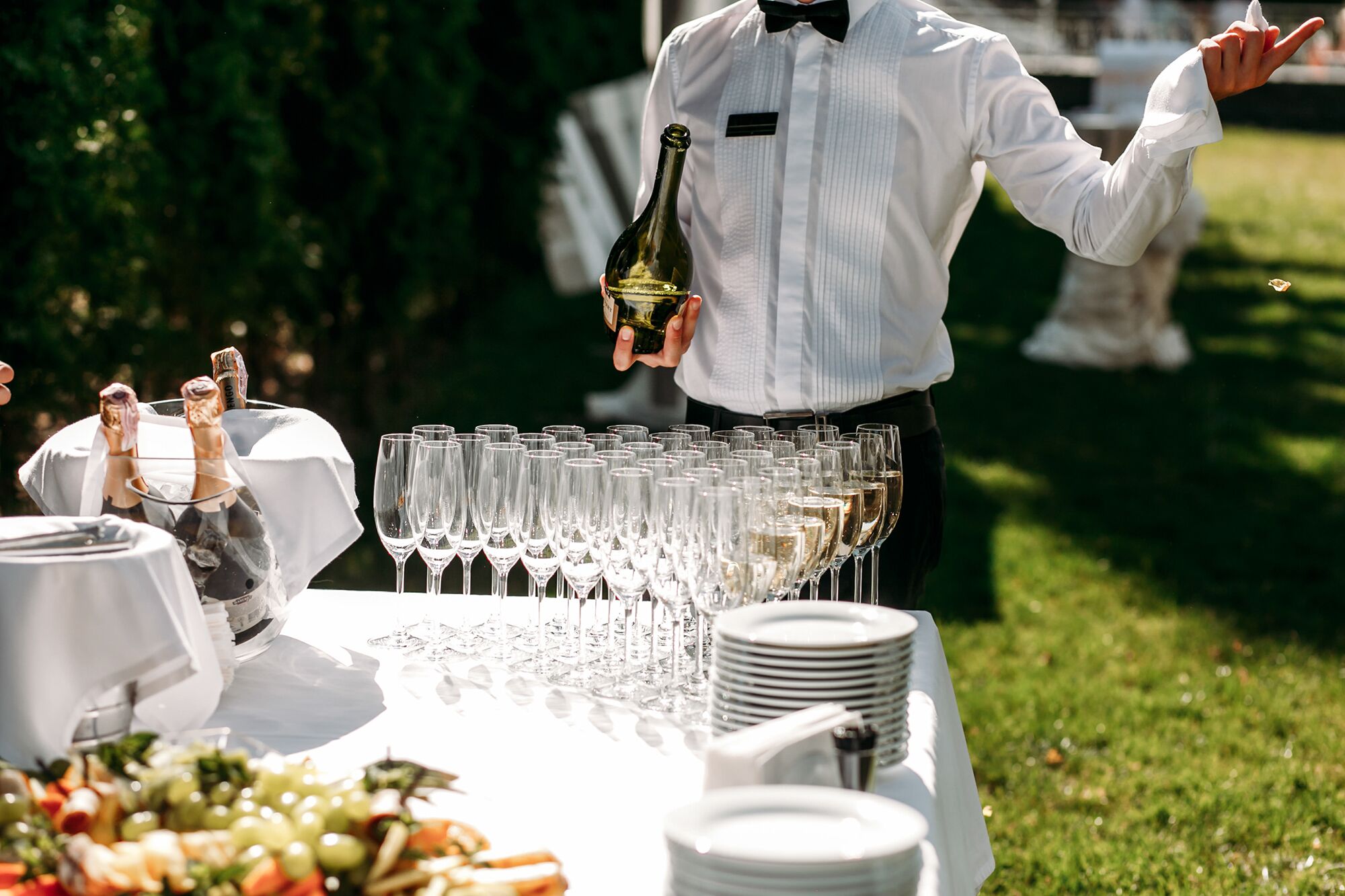Wedding bartender ready to serve champagne