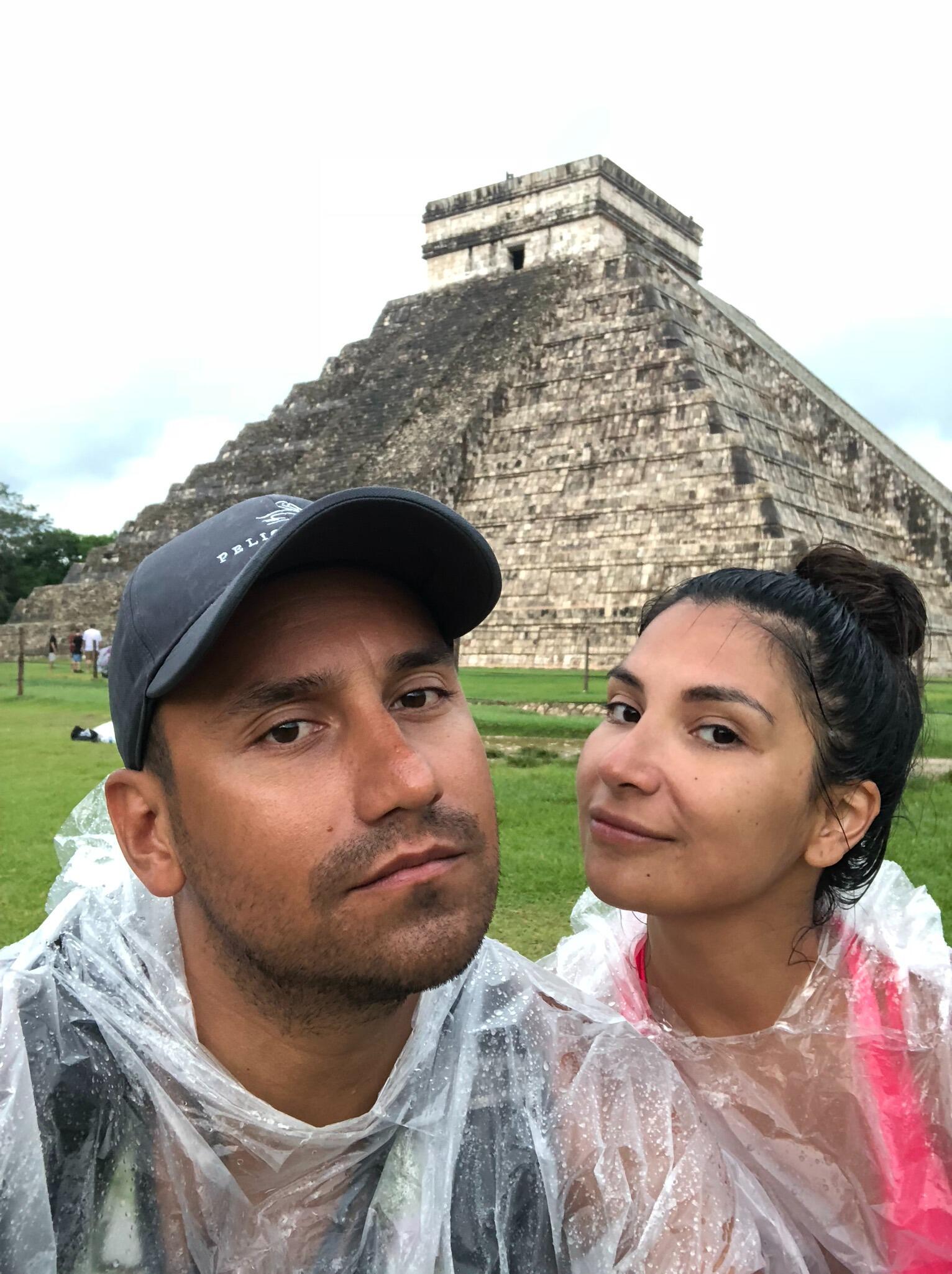 Here we are in front of a massive step pyramid, known as El Castillo or Temple of Kukulcan in Chichén Itzá (a complex of Mayan ruins on Mexico's Yucatán Peninsula). 