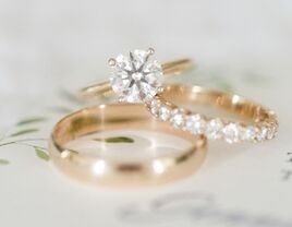 Stack of diamond engagement and wedding rings