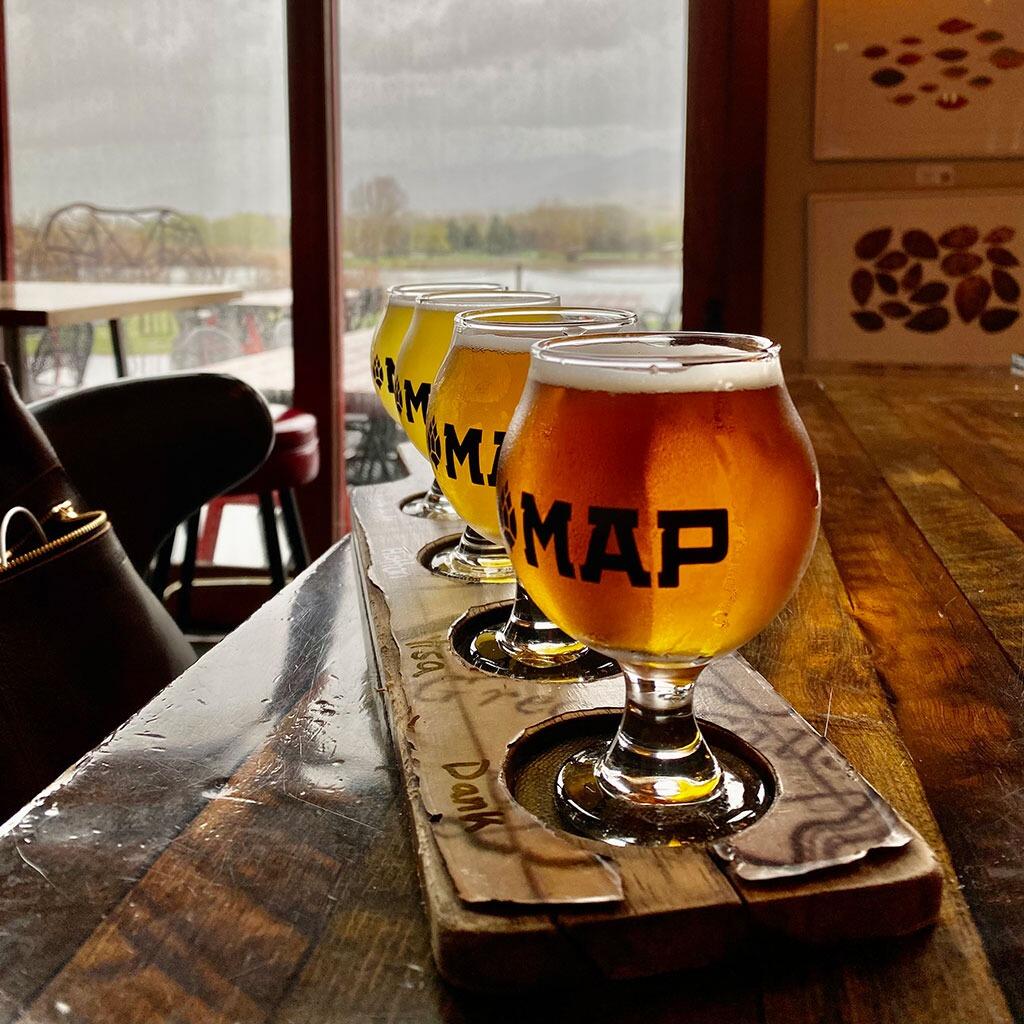 Hayden and Kelsey had their first date at Map Brewing before he even moved to Bozeman! He had just landed in town from a work trip, and couldn't head home until he met her. ;)
