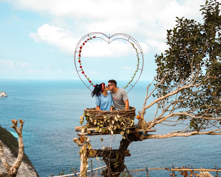 We love travelling and strive to capture as many photos as possible. Here we are in Bali visiting an island called Nusa Penida.