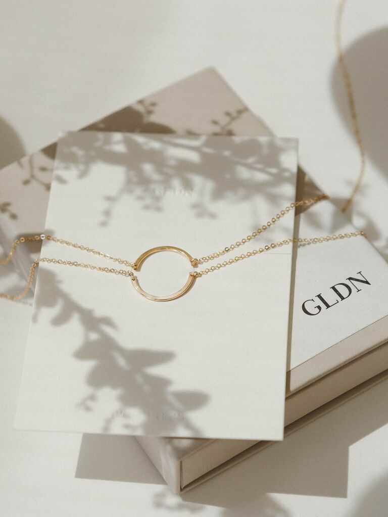 Dainty gold friendship necklaces that each depict half of a circle wedding gift for sister
