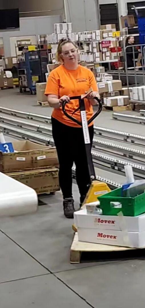 First met at Krones where they both worked, and Amber still currently works.  This is the first ever picture Tom took of Amber (not a great one) but Tom always liked to complain about how good Amber was at her job because the more work she did, the more Tom had to do as well. 