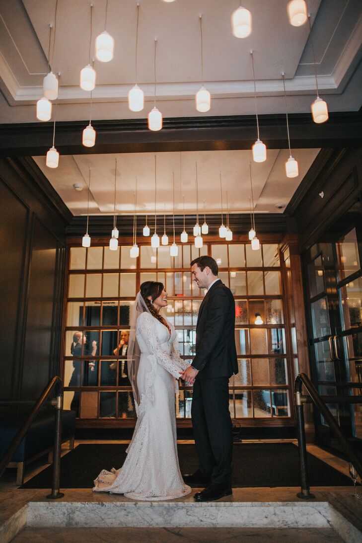 Bride And Groom At Entrance To The Press Hotel