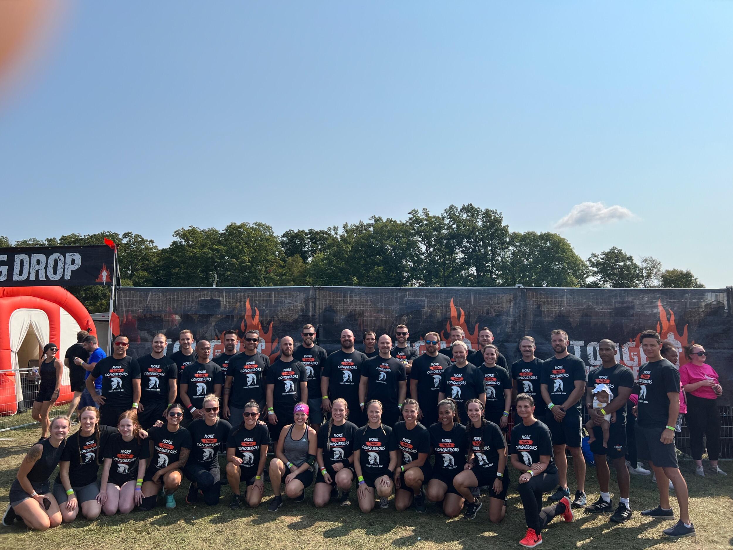 Running the Tough Mudder obstacle race, and our first picture together