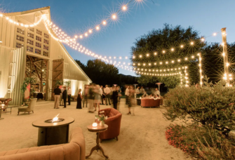 Gorgeous wedding lighting idea with fire pit