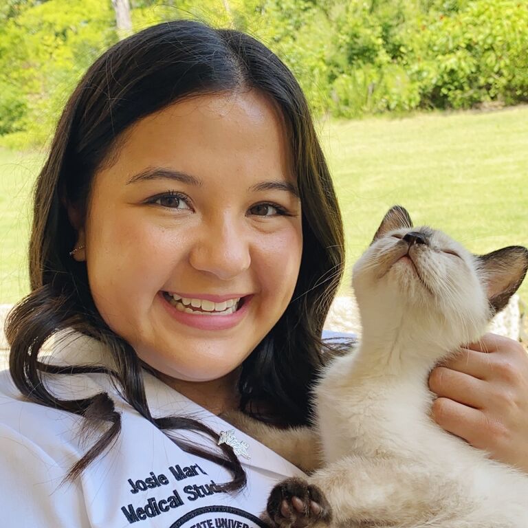 A special week! Josie received her white coat; Josie and Tony adopted their Siamese kitty, Margot. 