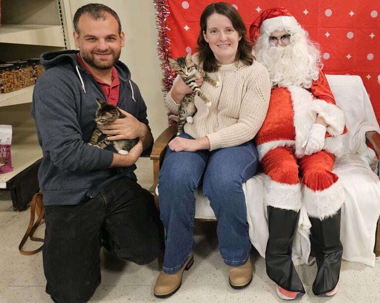 Lizzy and Polly meet Santa Claus.