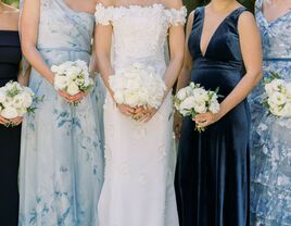 bride with bridesmaids in light blue and navy blue mix-and-match dresses