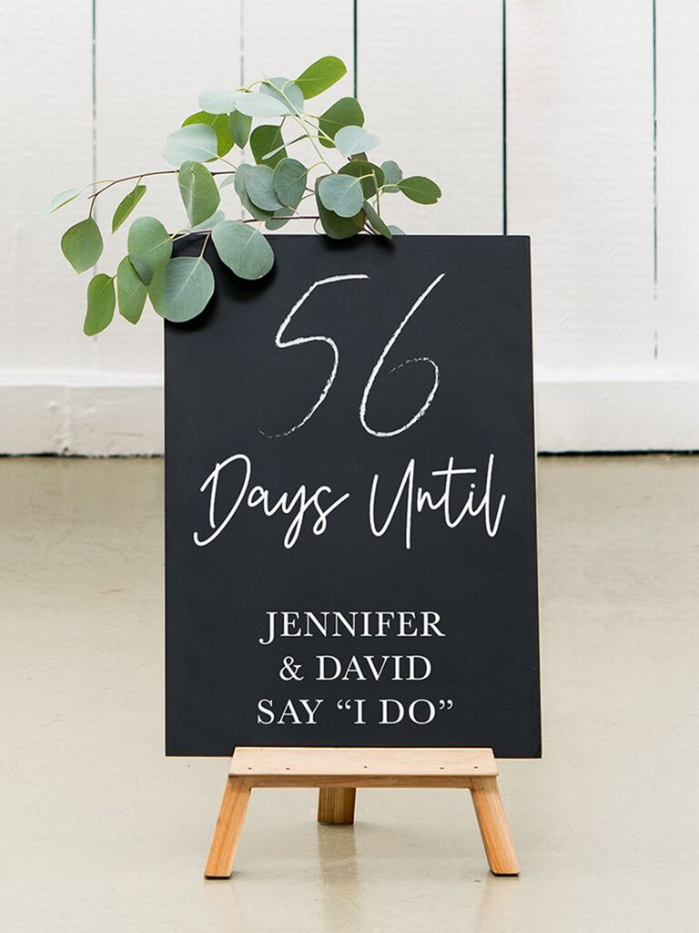 Countdown chalkboard sign with calligraphy and simple serif type