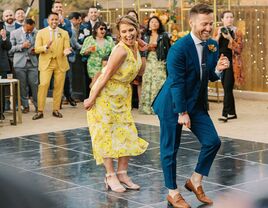 Mother and son dancing at wedding 